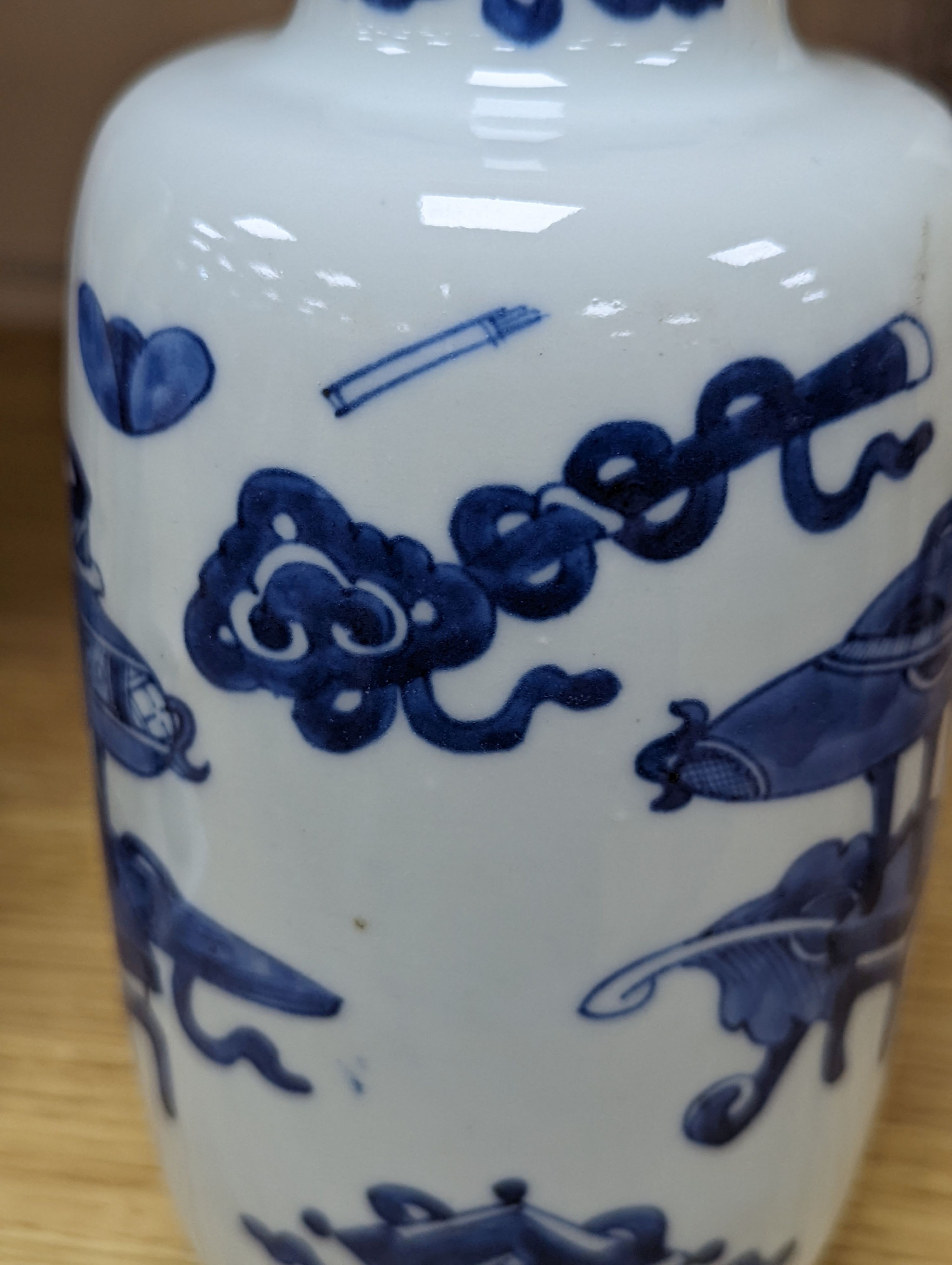 A Chinese blue and white ‘Antiques’ vase, 19.5 cms high.